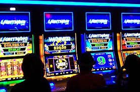 A group of people playing a 19.71" Touch Sensor, Part CPM3107C (Ino Touch Sensor C11209), in a casino. Fits IGT, WMS, Aristocrat, Others... Replaces 3M touch sensor 17-8051-206.