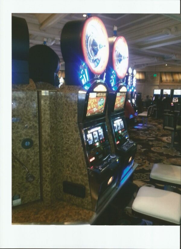 Polaroid of a slot machine in a casino.