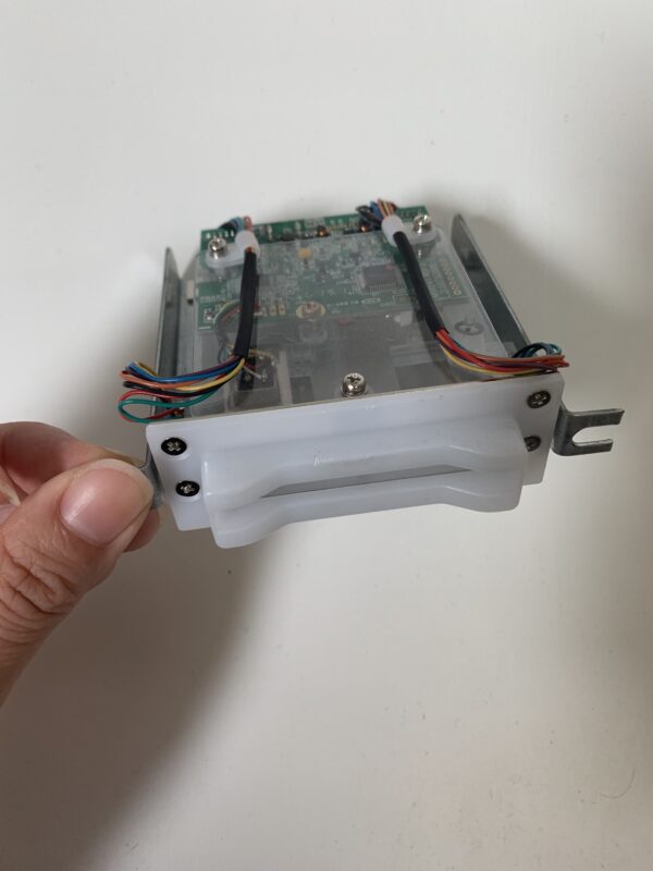 A hand holding an ATI Oasis Sentinel 5 USB Card Reader. GETT Part PTSU117.