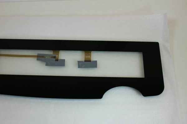 A black rectangular object with a transparent glass.