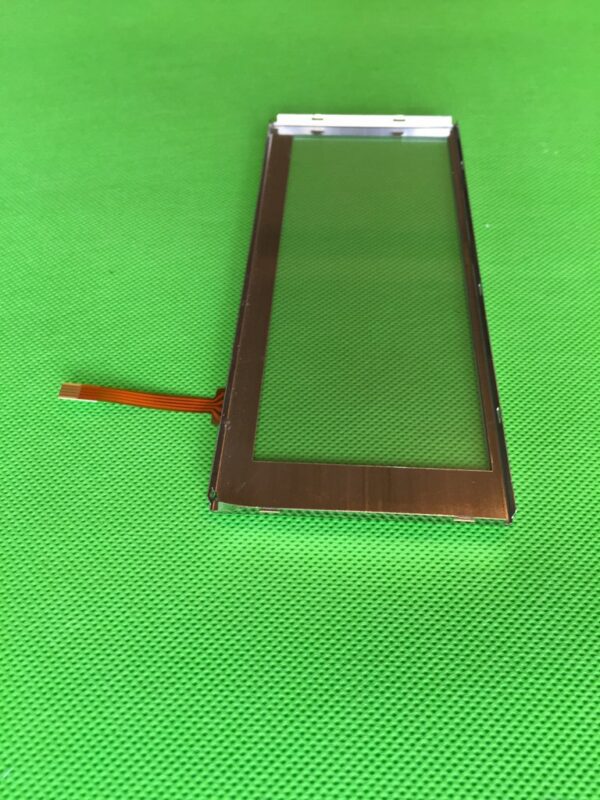 A small 4 WIRE TOUCHSCREEN for 6.2"LCD on a green surface.