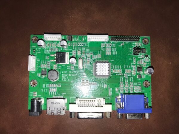 A green AD Board 2120337, Fits 23"Tatung Monitors for use with Bally Games, Others pcb board on a table.