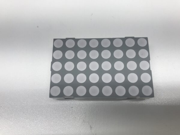 A gray LED Cells for Progressive Meters and More with white dots on it.