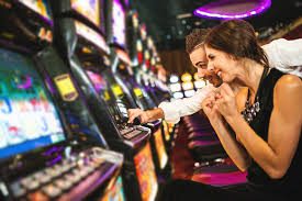 A man and woman playing LED Cells for Progressive Meters and More in a casino. LITE-ON TECHNOLOGY CORPORATION. GETT Part LED Meter 100.