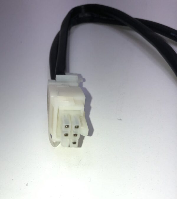 A white and black wire connected to a Bill Validator Cable, Misc Part BV169 surface.