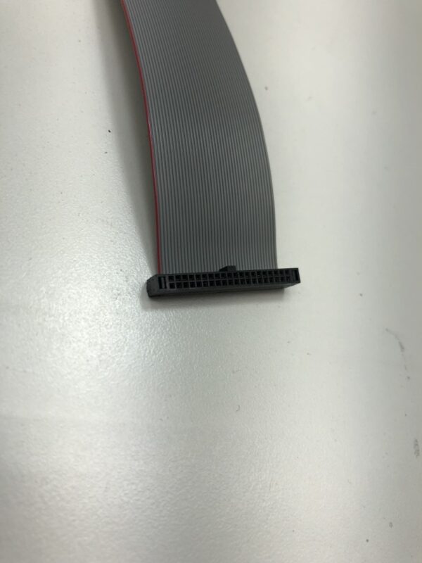 A black and red Cable for Bill Validator on a white surface. See Photo. BV175.