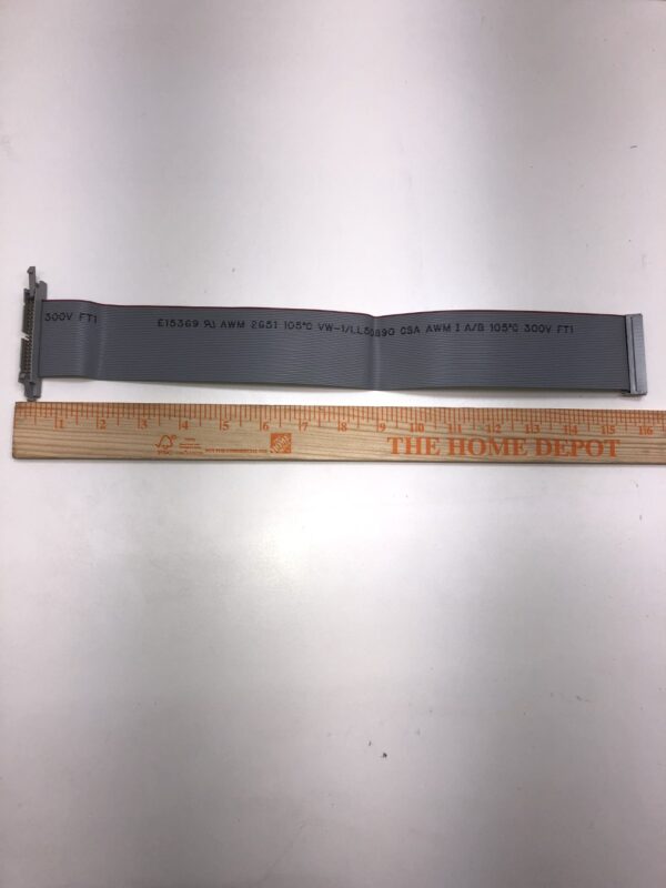 A ruler with a Cable for Bill Validator attached to it. See Photo. BV176.