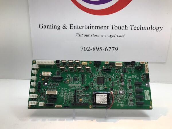 A IGT AVP Backplane LXS Slant Top gaming and entertainment technology board in front of a sign.