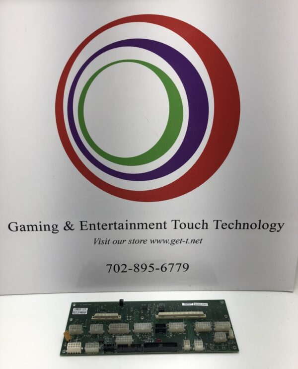 A IGT 960 Enhanced BackPlane Board. Model 2734-3. GETT Part BPLN113 gaming and entertainment technology board in front of a sign.