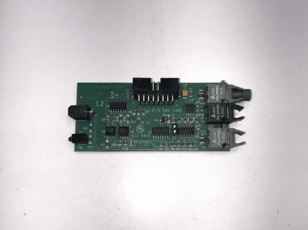 A IGT AVP Fiber Optic Comm. Board on a white surface.