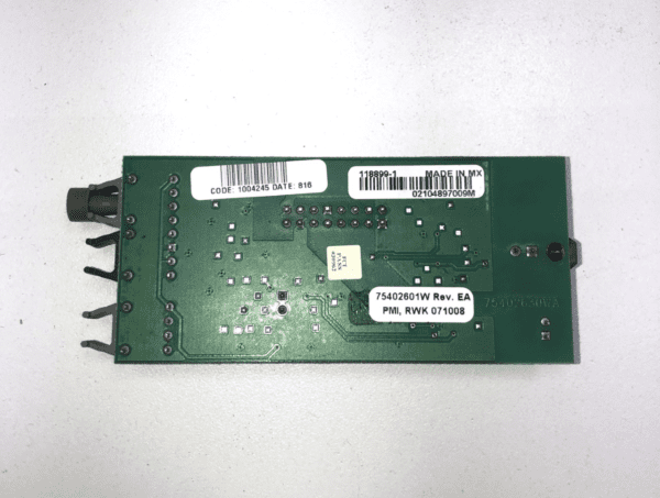 A green IGT AVP Fiber Optic Comm. Board with a label on it.
