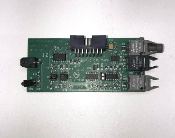 A small IGT AVP Fiber Optic Comm. Board with a number of electronic components on it.