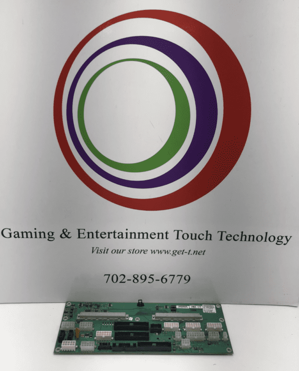 An IGT S2000 Enhanced BackPlane Board in front of a sign.