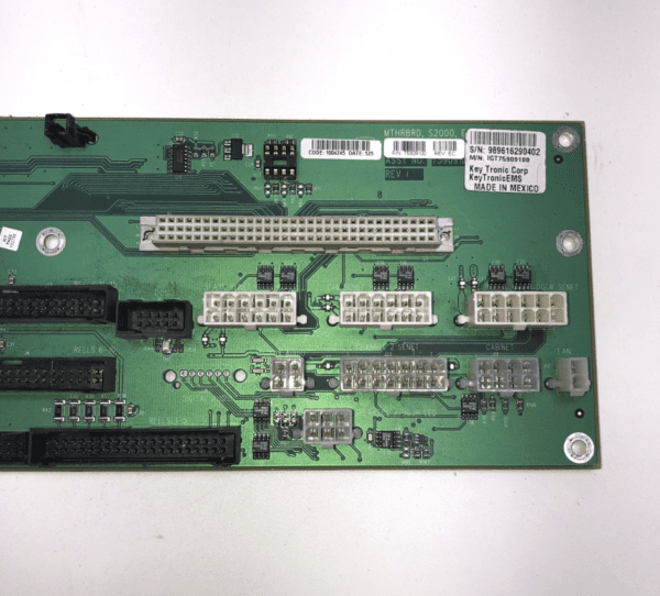 An IGT S2000 Enhanced BackPlane Board with a number of components on it.
