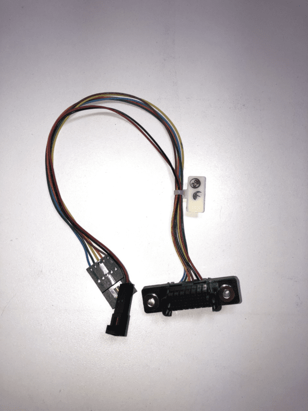 A JCM Cable for WBA and UBA Bill acceptor with wires attached to it.