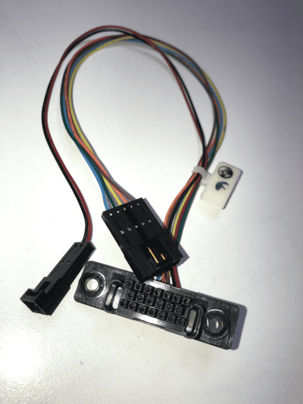 A small JCM Cable for WBA and UBA Bill acceptor with wires attached to it.