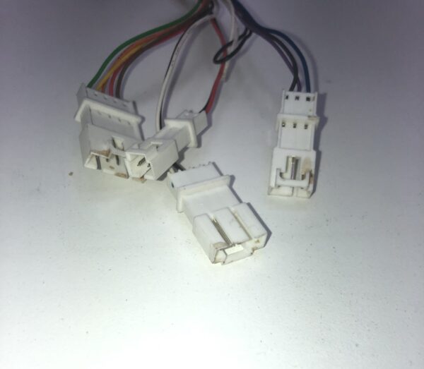 A set of JCM Cable for WBA and UBA Bill acceptor wires on a white surface.