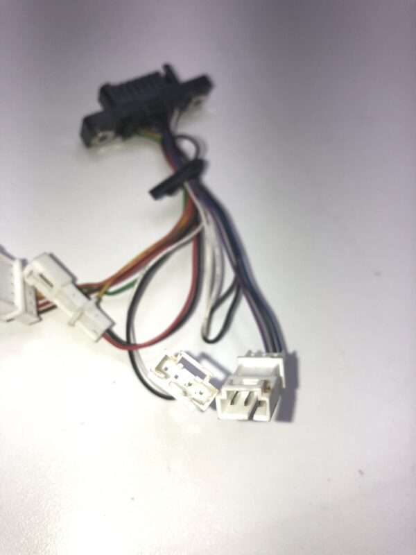 A JCM Cable for WBA and UBA Bill acceptor wiring harness with wires attached to it.