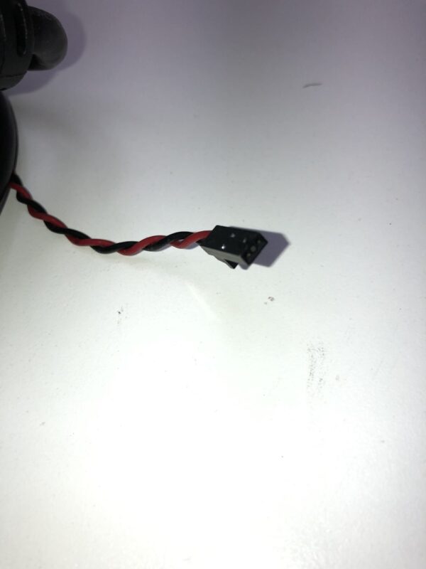 A black and red wire is attached to a white 19 Pin LCD Harness for Ceronix for IGT. GETT Part CPS1897 surface.
