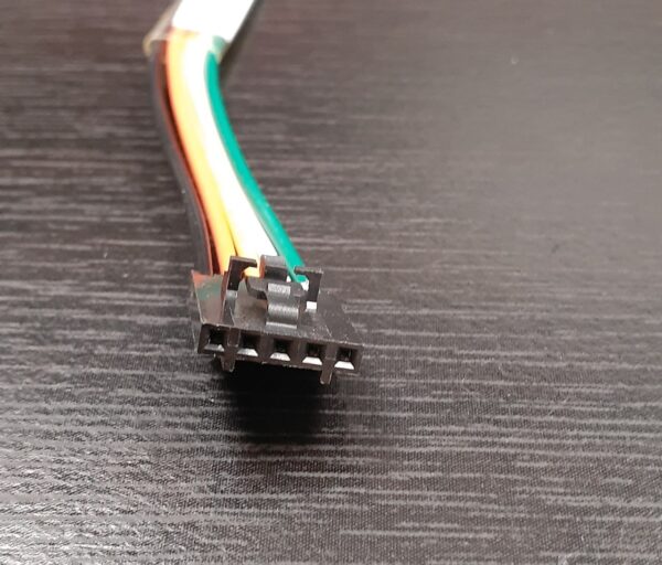 A 5-Pin Extension cable on top of a table.