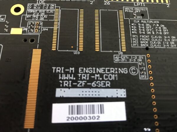 A close up of a Bally Gaming CPU Board with a label on it.