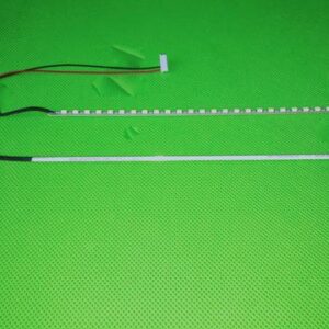 Two Konami 12V LED replacement bars for CCFL's, Cut to fit from 22" to 10". GETT Part LEDKIT100 on a green surface.