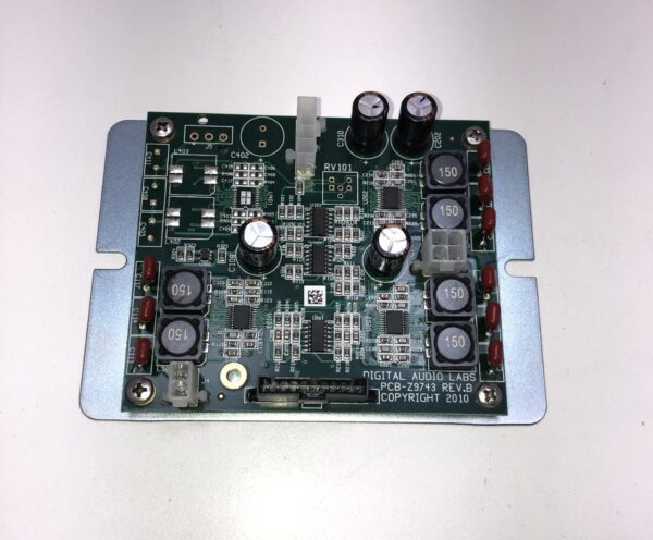 A small IGT AVP In-line Audio Amp Board on top of a table.