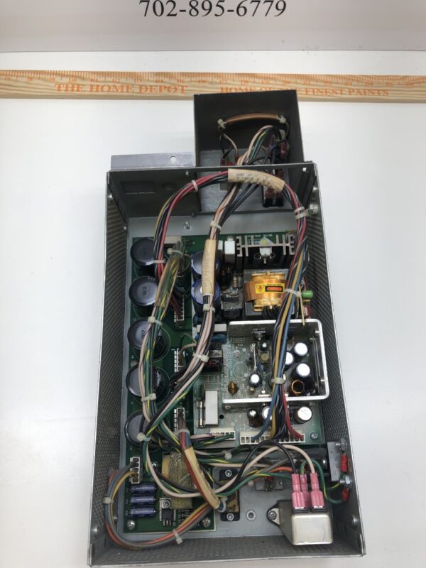 A Power Supply for WMS (Williams) Gaming 550 cabinet with wires attached to it. GETT Part PSUP173