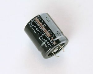 A 400v 150uf Nichicon Aluminum Electrolytic Capacitor on a white surface.