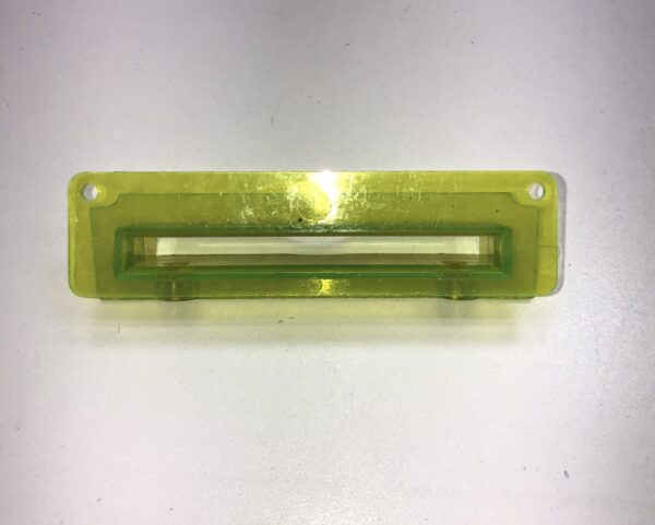 A Ticket Printer Bezel, Yellow Plastic on a white surface.