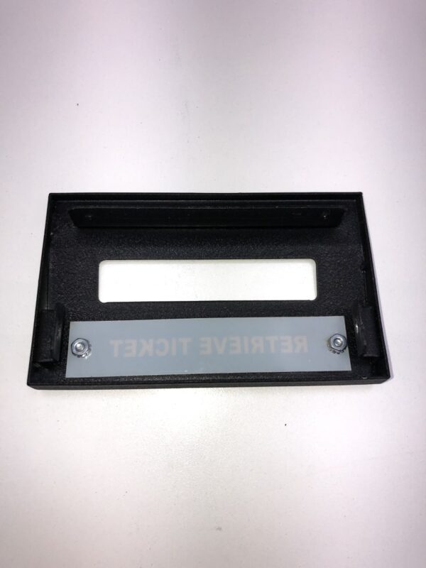 A black plate with the Retrieve Ticket Printer Bezel on it.