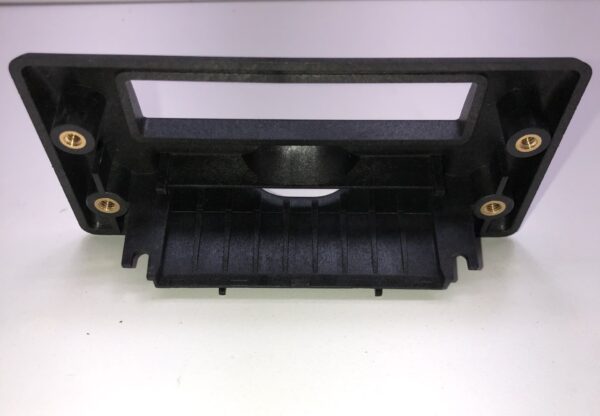 A black plastic Ticket Bezel with four screw heads. GETT Part Ticket120.