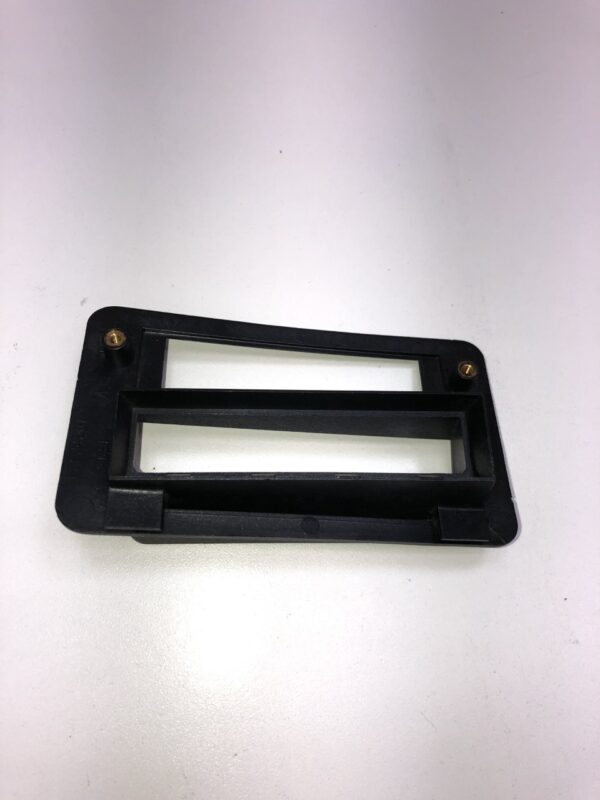 A Ticket Printer Bezel, Stock, Non Lit, Black Plastic cover for a door handle. GETT Part Ticket122.