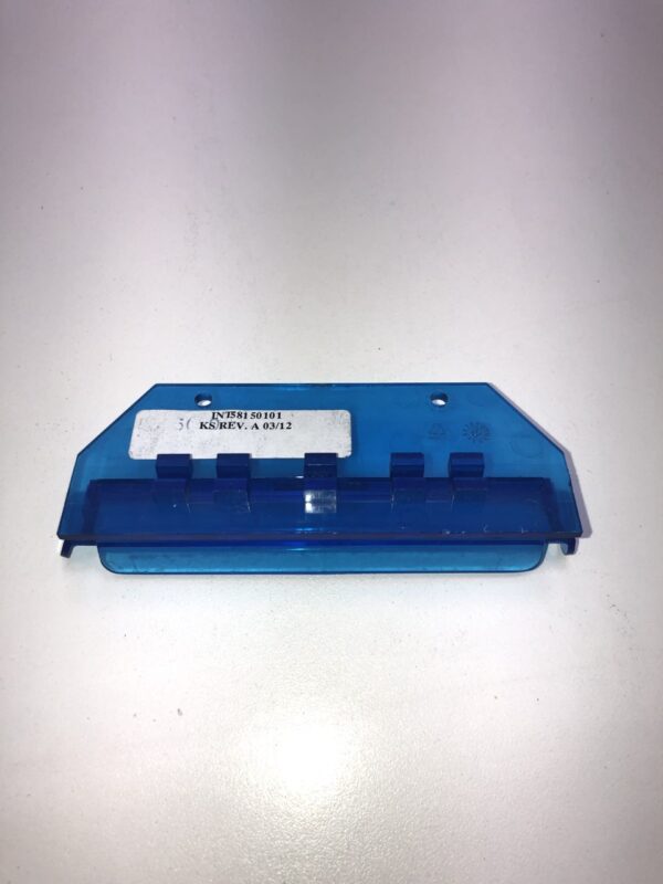 A blue plastic Ticket Printer Bezel for IGT Games on a white surface.