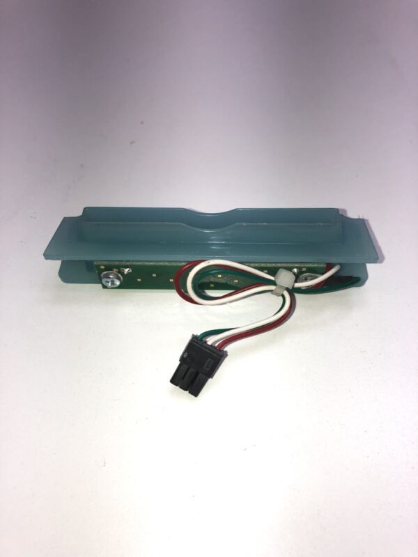 A Light Blue Plastic bezel with cable/ connector for Ticket Printer. See pics. GETT Part Ticket133