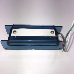 A blue plastic box with wires attached to it is the Ticket Printer Bezel with 3 pin connector. See pics. GETT Part Ticket134.