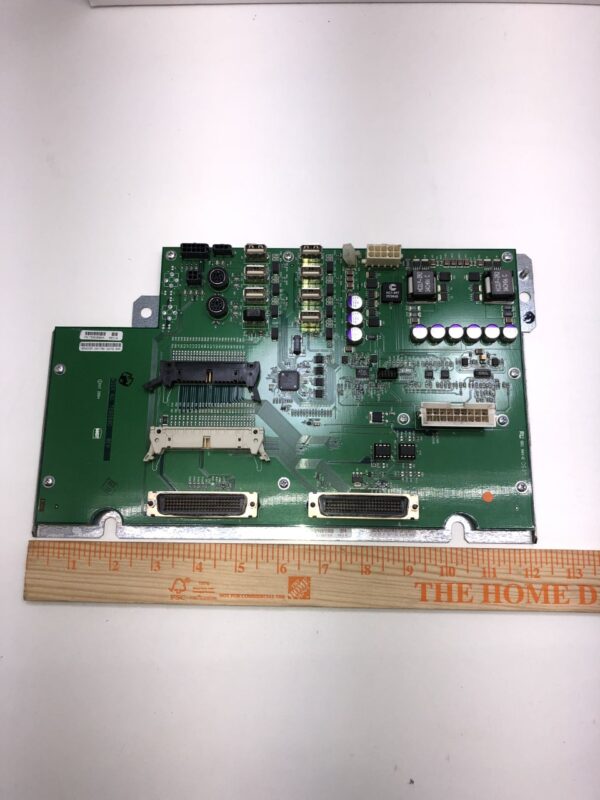 A Backplane for IGT AVP 2.0 Game with a ruler next to it.