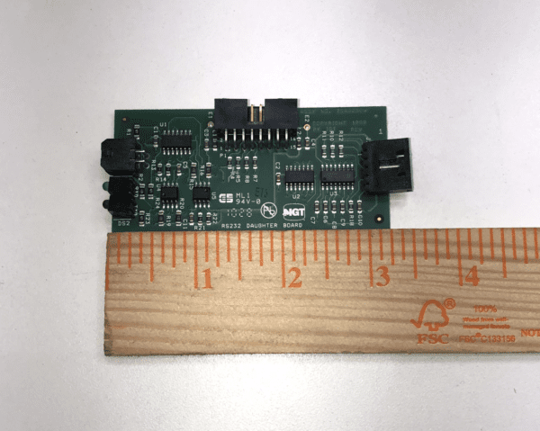 A Daughter Board for IGT AVP Game, Version fits RS232, next to a ruler.
