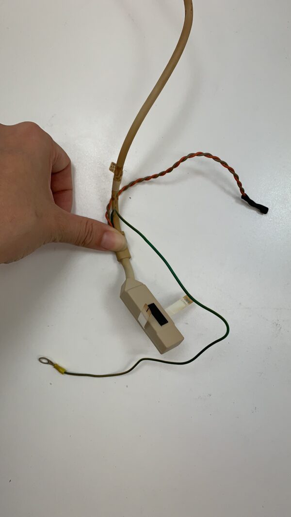 A hand holding a Digi Tech 19.83" Touch Sensor. Replacement for 3M Part 17-9141-206. GETT Part EST-190M wire.