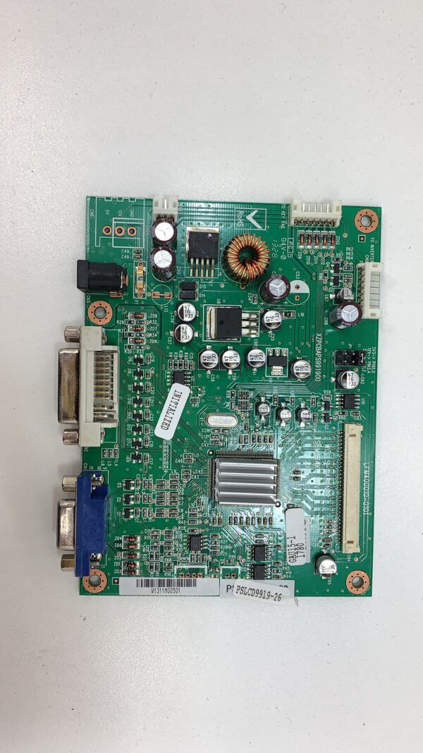 A green Wells Gardner AD board with many small components.
