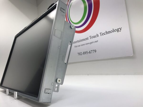 The Kristel Display LCD22- A05. GETT Part LCDM 1027T is sitting on a table in front of a sign.