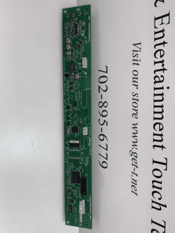 A LED Reader Board for Aruze Innovator Games with the words entertainment touch on it. Noritake Itron Part: GU512X32H-3101 11L12LLR. VFD Display. GETT Part LED115.