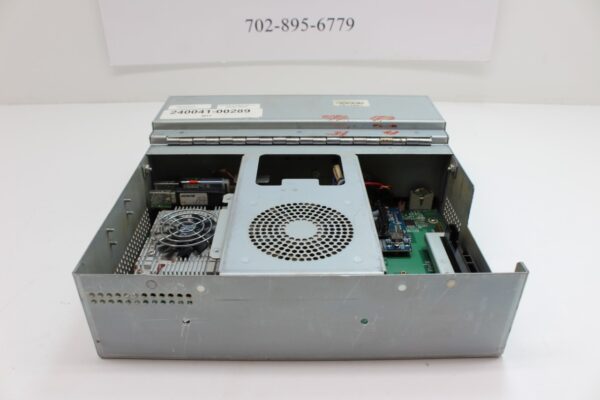 A small metal box with the Multi Media Games, WBV game CPU, MMGAM Part 240041-00289, GETT part CPU170 inside.