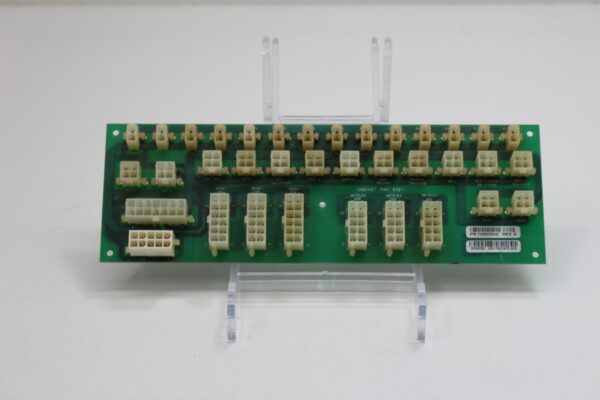 A green IGT Game King circuit board with many small white and brown connectors.