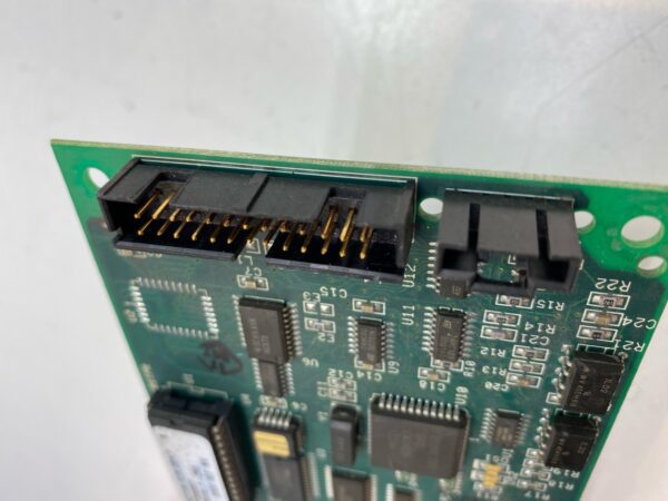 A close up of a small IGT Display Controller, VFD Display IGT S2000 Upright. Part PCB104 electronic board.