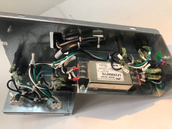 A metal box with wires and the Power Distribution Unit, Konami K2V Games. GETT Part PCBA106 inside.