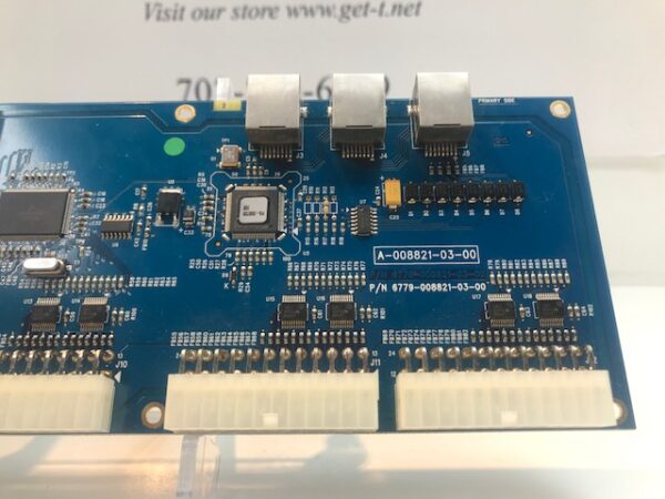 A blue WMS BBI Reel Driver Board with a number of components on it.
