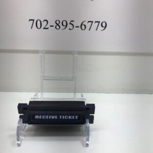 A sign with the word WMS BB2 Ticket Printer Bezel. Part 102-A-021293-02-00-R. GETT Part BV260 on it.