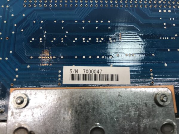 A close up of a Konami Advantage 5 CPU with a barcode on it.