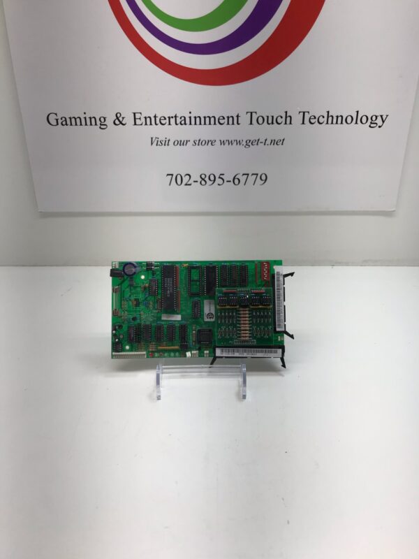 A gaming and entertainment technology IGT Games- Mikohn/ PGI Smart Interface Board on a table.